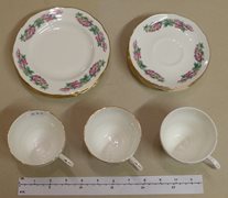 Five Side Plates, Four Saucers and Three Teacups