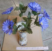 Artifical Flowers in Floral Patterned Vase