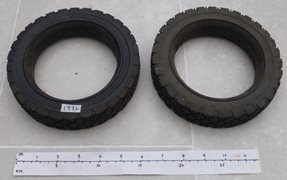Two Unused Small Solid Rubber Tyres