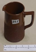 Large Brown Jug with Textured Lower Section